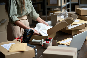 1 Growth Stock Down 25% in 2026 to Buy and Hold: https://g.foolcdn.com/editorial/images/857628/person-packing-shipping-boxes.jpg