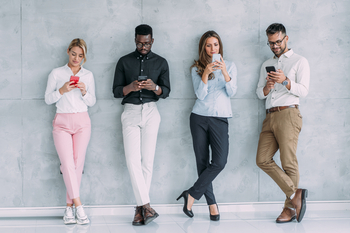 2 Monster Stocks to Hold for the Next 10 Years: https://g.foolcdn.com/editorial/images/858392/workers-looking-at-phones.jpg