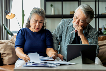 These 4 Groups Won't Qualify for the New Senior Tax Deduction: https://g.foolcdn.com/editorial/images/858602/stressed-couple-looking-at-documents-together.jpg