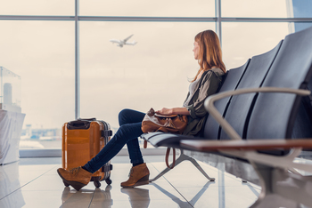 Should Dividend Investors Buy PAC Stock After Mexico Travel Warnings?: https://g.foolcdn.com/editorial/images/858149/waiting-at-airport-luggage-plane-take-off.jpg