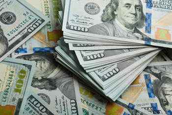 Investors in This ETF Have Earned Far More Than They Could Have Reasonably Expected: https://g.foolcdn.com/editorial/images/859440/large-pile-of-hundred-dollar-bills-cash-money-savings-rich.jpg