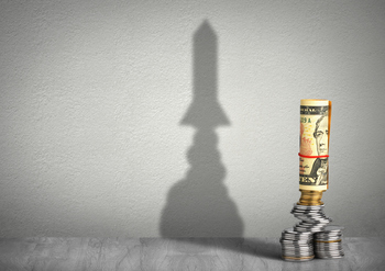 Is Energy Transfer Stock Going to $30?: https://g.foolcdn.com/editorial/images/857598/a-stack-of-money-casting-a-shadow-that-looks-like-a-rocket-ship-in-the-background.jpg