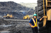 3 Reasons to Buy Caterpillar Stock in 2026: https://g.foolcdn.com/editorial/images/857579/21_05_18-a-person-in-protective-gear-standing-by-a-giant-truck-in-a-mine-site-_gettyimages-509610535.jpg