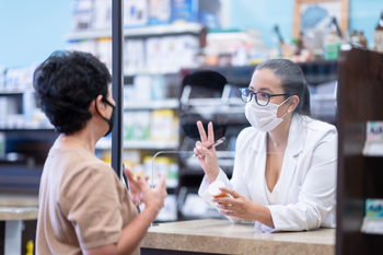 2 Top AI Healthcare Stocks to Buy and Hold: https://g.foolcdn.com/editorial/images/859008/pharmacist-talking-to-patient.jpg
