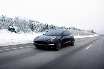Prediction: This Popular Stock Will Tumble Out of the $1 Trillion Club in 2026: https://g.foolcdn.com/editorial/images/859359/a-black-tesla-car-driving-on-an-open-road-in-the-snow.jpg