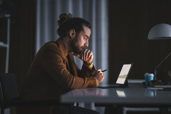 2 Under-the-Radar Stocks to Buy and Hold: https://g.foolcdn.com/editorial/images/859437/person-working-at-a-desk.jpg