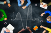 Where Will Chevron Be in 1 Year?: https://g.foolcdn.com/editorial/images/858401/24_03_06-a-group-of-people-looking-at-a-parabola-and-math-equations-written-in-chalk-on-a-table-_mf-dload-_-1201x785-ed38d50.jpg