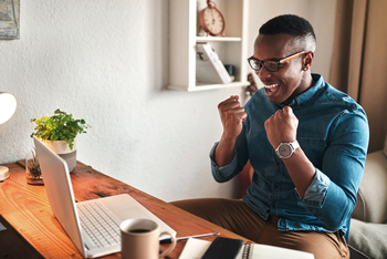 Up 31% in 3 Months, Is This High-Yield Dividend King Stock Still a Buy in March?: https://g.foolcdn.com/editorial/images/859927/an-investor-clenches-their-fists-in-excitement-while-sitting-at-a-desk-in-front-of-a-laptop-computer.jpg