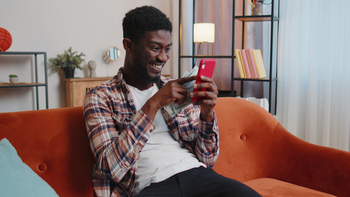 Why Viant Technology Stock Raced 12% Higher Today: https://g.foolcdn.com/editorial/images/860539/person-on-a-couch-smiling-while-using-a-smartphone.jpg