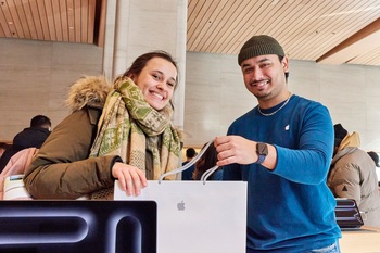 You Won't Believe How Much Money Berkshire Hathaway Gets From Apple Dividends: https://g.foolcdn.com/editorial/images/859874/apple-sainte-catherine-montreal-canada-opening-day-team-member-handing-customer-their-purchase.jpg